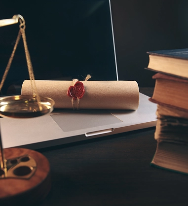 weighing scale and books on a lawyer's table